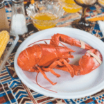 lobster on plate get maine lobster-seafood delivery-mealfinds