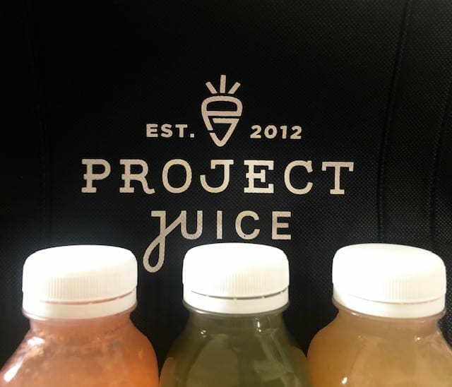 project juice logo with 3 juice bottles in front-project juice juice cleanse review-mealfinds