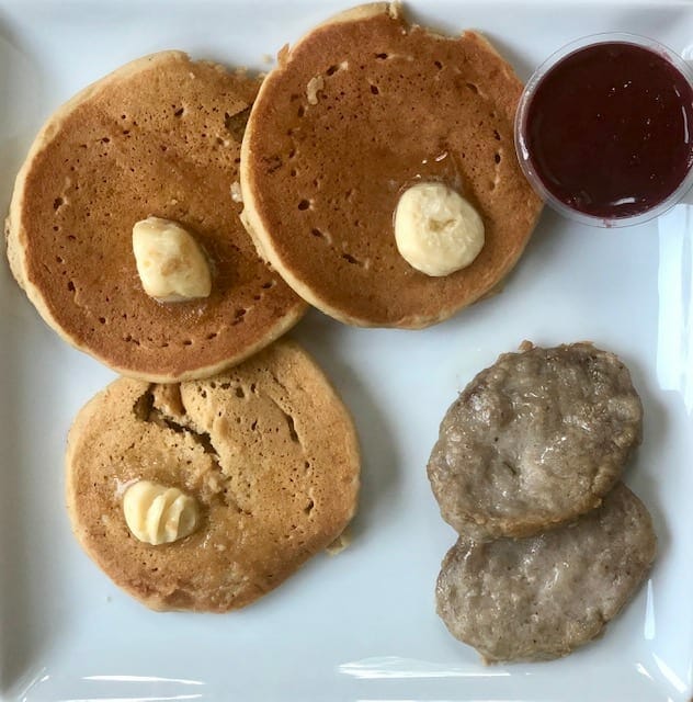 pancakes and sauage on plate with butter-factor healthy prepared meals reviews - mealfinds