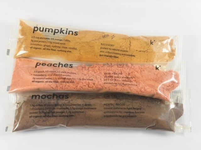three smoothie packets on table-kencko reviews-mealfinds