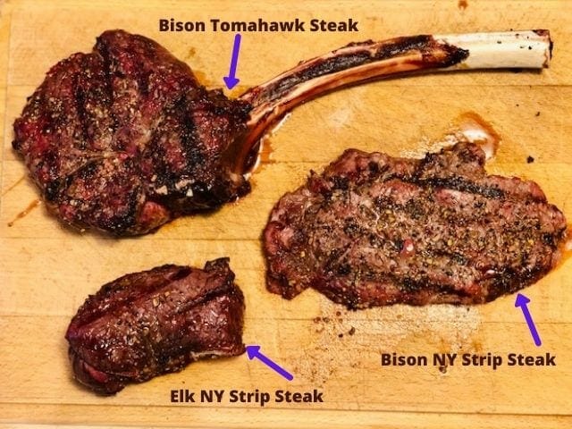 cutting board with bison and elk steaks-The Honest Bison Bison Meat Reviews-mealfinds