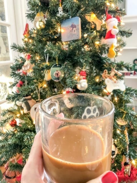 coffee mug in front of christmas tree-copper cow coffee reviews-mealfinds