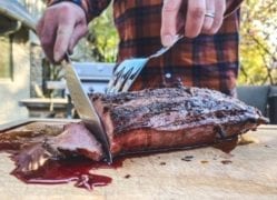 slicing chateaubriand on cutting board-crowd cow review-mealfinds