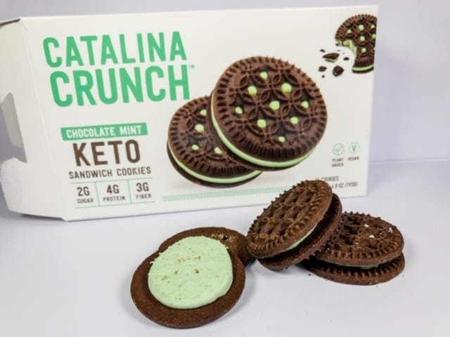catalina-crunch-mint-keto-cookies on table with box-catalina crunch keto cereal reviews-mealfinds