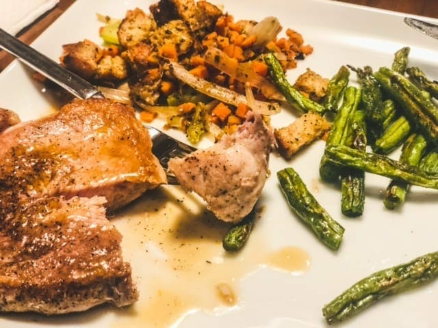 pork chops on plate with green beans and stuffing-green chef reviews-mealfinds