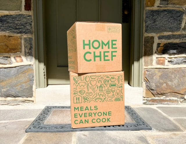 home chef boxes stacked outside door-home chef meal reviews-mealfinds