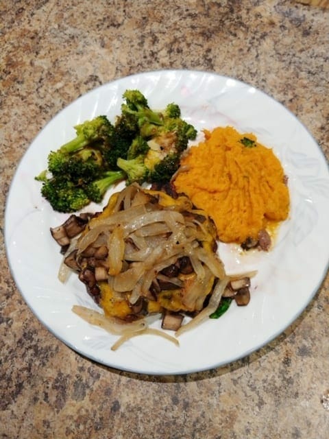 bison burger with brocolli meal on plate-top chef meals reviews-mealfinds