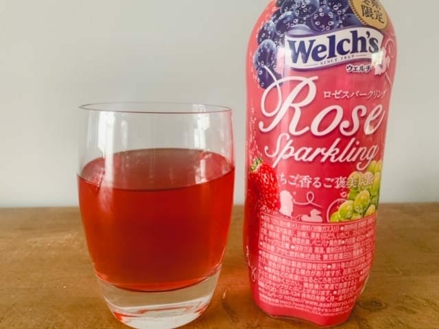 welchs sparkling rose bottle next to filled glass-tokyotreat box review-mealfinds
