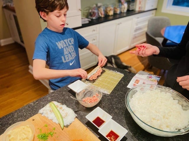 boy mkaing sushi - Sushify Meal Kit Reviews - MealFinds