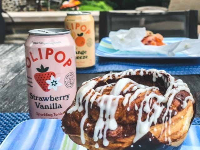 olipop cans on table with brunch-olipop soda review-mealfinds
