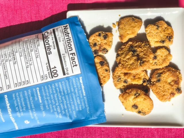 nunbelievable chocolate chip low carb cookies spilled onto plate from bag-nunbelievable cookies reviews-mealfinds