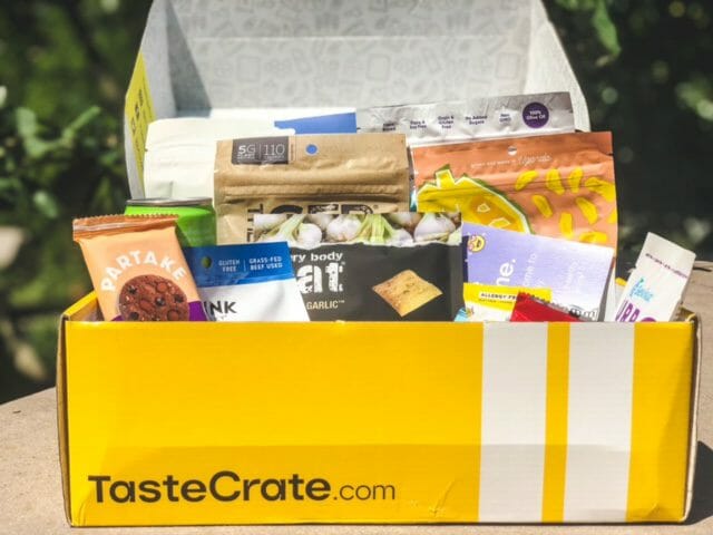 tastecrate box open with snacks and logo-tastecrate review-mealfinds