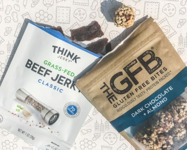 think jerky gfb chocolate almond balls spilling out of packaging-tastecrate review-mealfinds