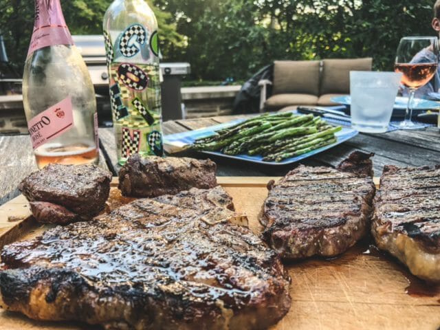 porterhouse steak new york strips and filet mignon on cutting board-good chop reviews-mealfinds