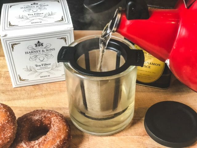 brewing hot cinnamon spice tea in filter with donuts-harney and sons reviews-mealfinds