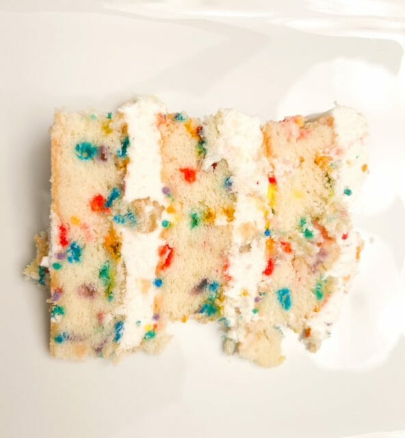 milk bar vanilla 6 inch birthday cake slice-milk bar birthday cake review-mealfinds