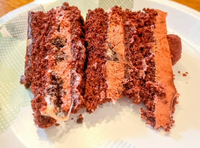 slice of red velvet milk bar cake-milk bar birthday cake reviews-mealfinds