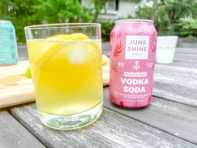 passionfruit vodka soda can and glass-juneshine drink review-mealfinds