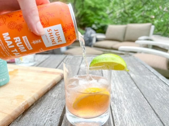 rum mai tai pouring into glass-juneshine drink review-mealfinds