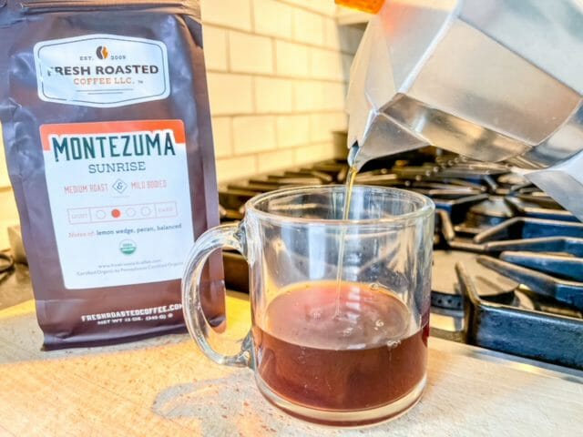 montezuma organic coffee poured into mug-fresh roasted coffee review-mealfinds