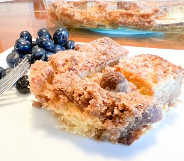 french toast on plate with blueberries-sourdough bread french toast casserole recipe-mealfinds