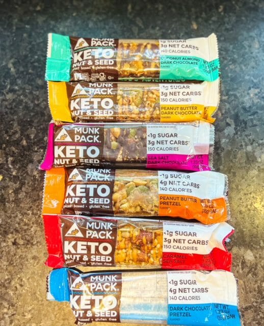 nut and seed keto granola bars lined up-munk pack keto granola bar review-mealfinds